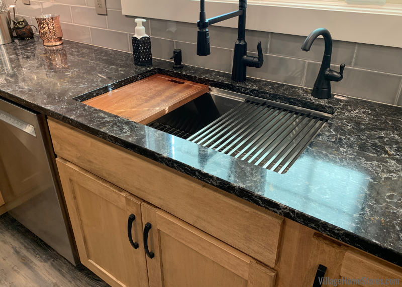 Image of Ruvati undermount workstation sink with cutting board and accessories in place
