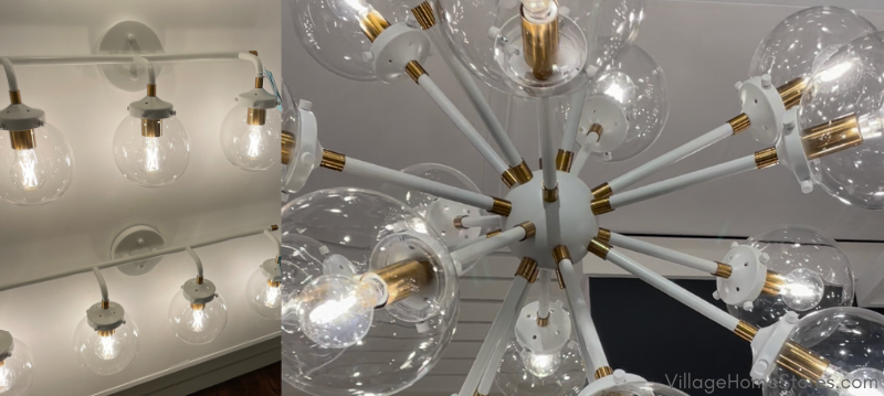white and brass lighting including bathroom vanity lights and sputnik style chandelier 