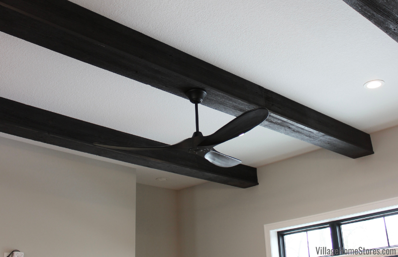 60" Maverick Matte Black ceiling fan on wood beam.