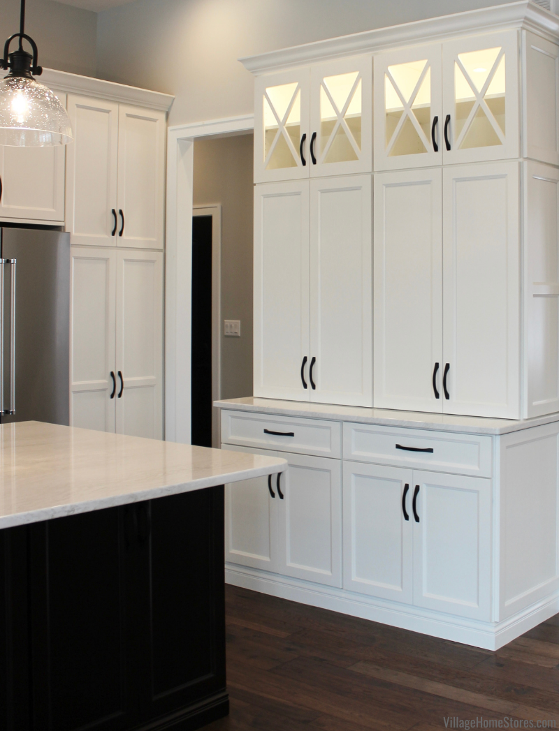X design glass door cabinet doors in kitchen from Village Home Stores for Hazelwood Homes.