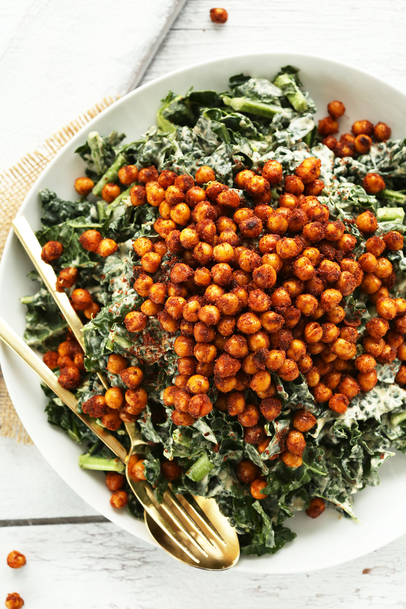 Overhead shot of crispy, garlicky chickpeas over a bed of kale