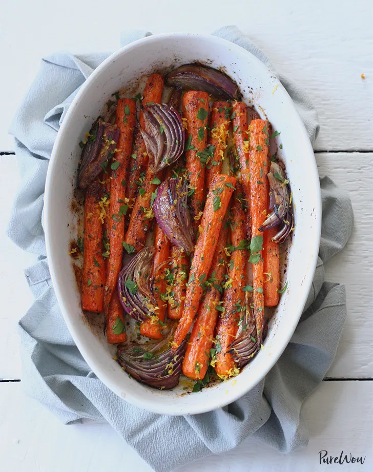Overhead shot of casserole with roasted carrots and onions