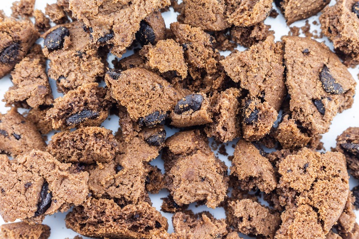 Chocolate cookies broken into fine pieces.