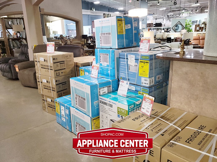 Stack of boxes in appliance store.