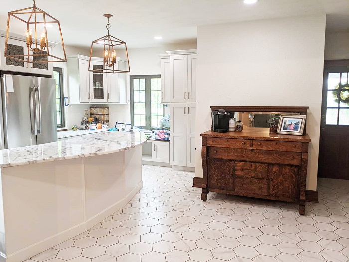 Wide angle of modern kitchen with coffee bar.