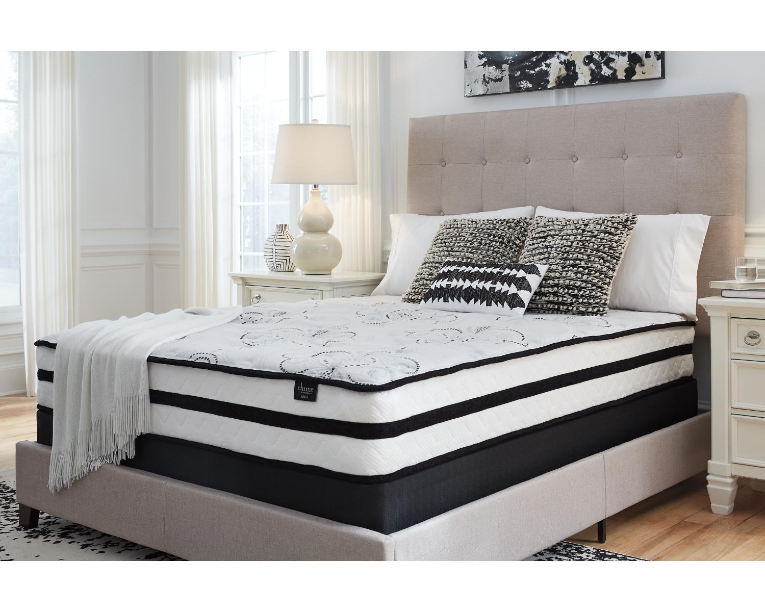 New mattress in a bright bedroom.