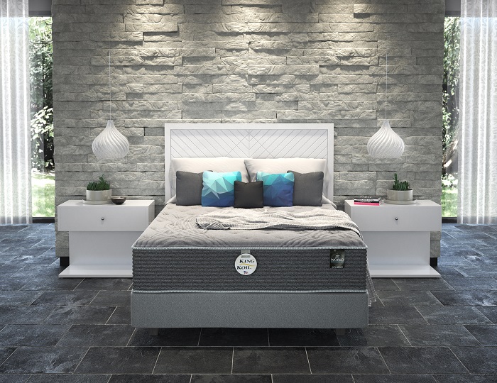 Modern bedroom with contemporary lighting and a luxurious mattress.