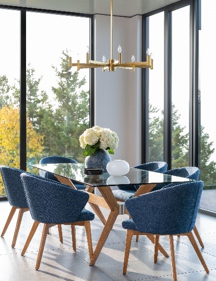 Wide shot of Canadel dining set featuring blue saucer chairs
