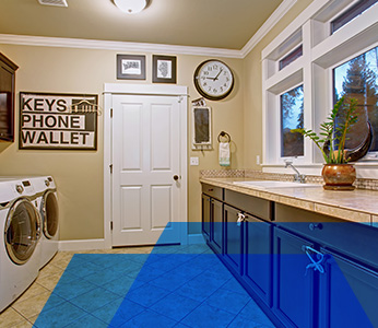 laundry room with white washer and dryer.