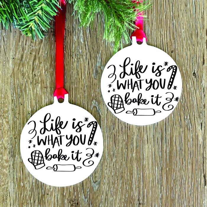 Two homemade Christmas ornaments.