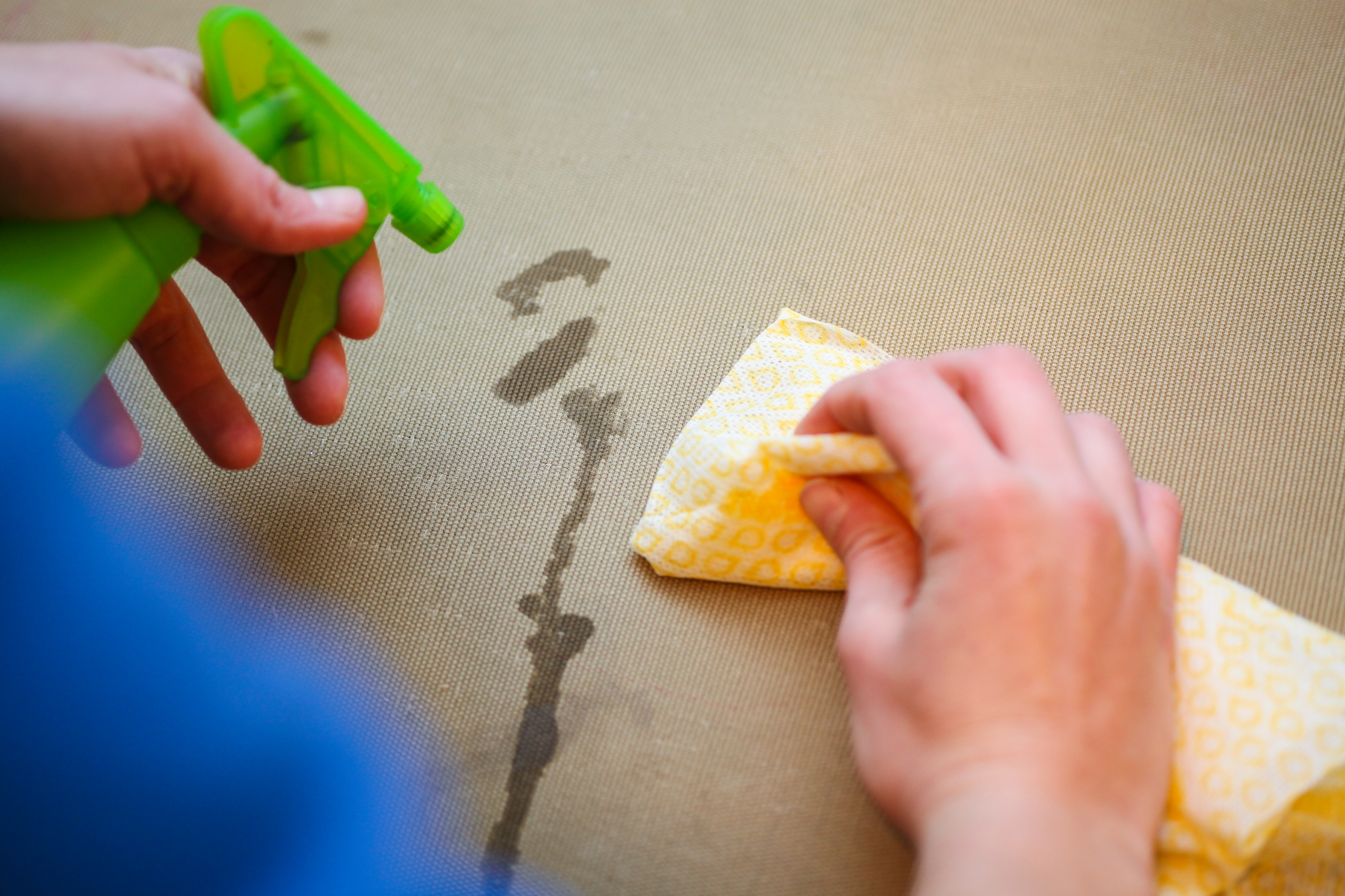 cleaning a stain off of a couch