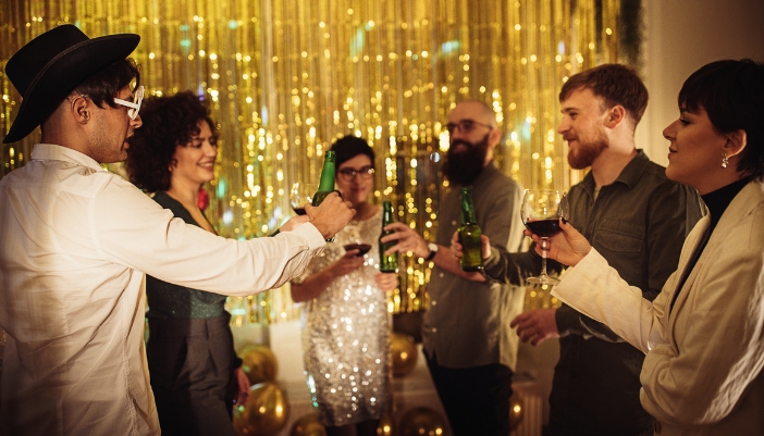 Adults celebrating the themed watch party