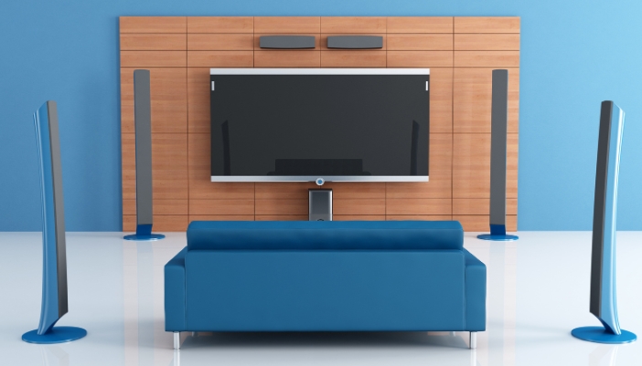 A surround sound system with speakers surrounding the listener
