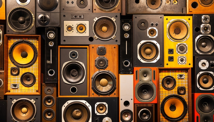 A wall of speakers with different drivers