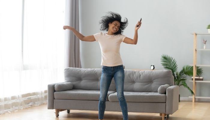 woman dancing in living room
