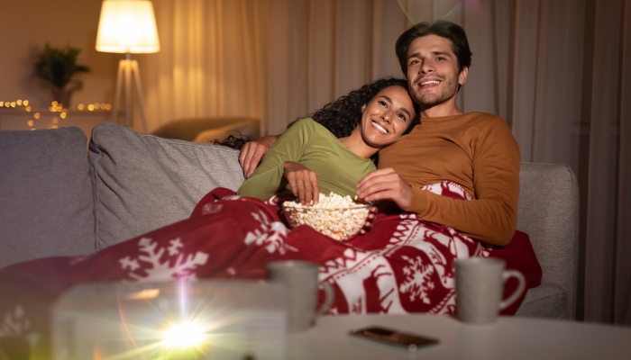 Movie date night with smiling couple