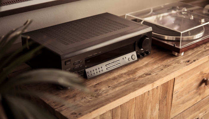 photo of turntable next to amplifier