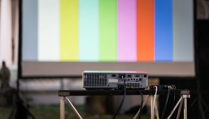 movie projector in backyard movie theater
