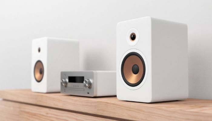stylish, new speakers next to audio system