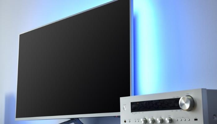 TV with backlight and audio receiver