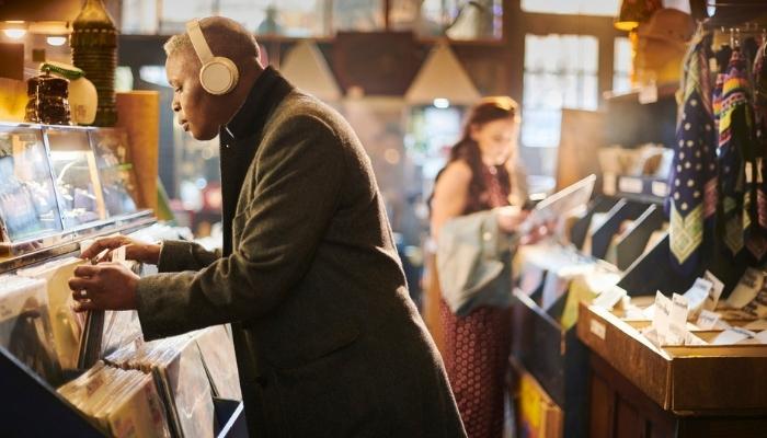 person browsing records in a vintage shop