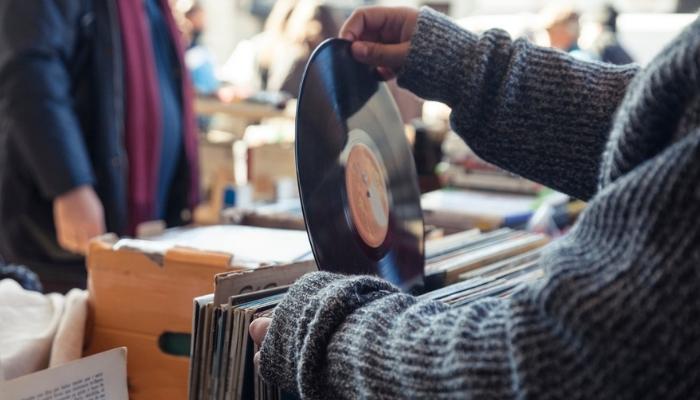 person browsing vinyl discs