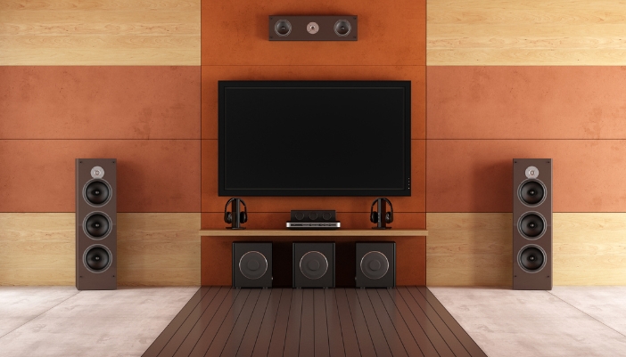 A home audio setup with surround sound and premium headphones