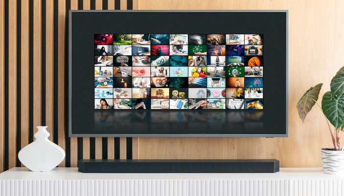 A TV with paired with a similar sized soundbar