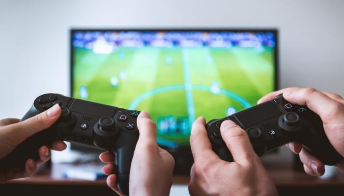 People playing video games on TV