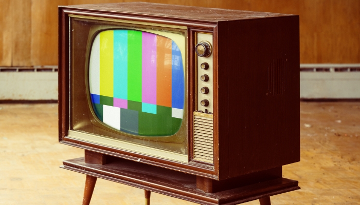 Old-school box TV with the broadcast color signal lines