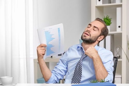 Uncomfortable Business Man in Office