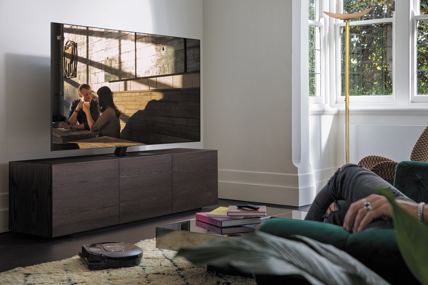 couple watches movie on Samsung Q80T TV
