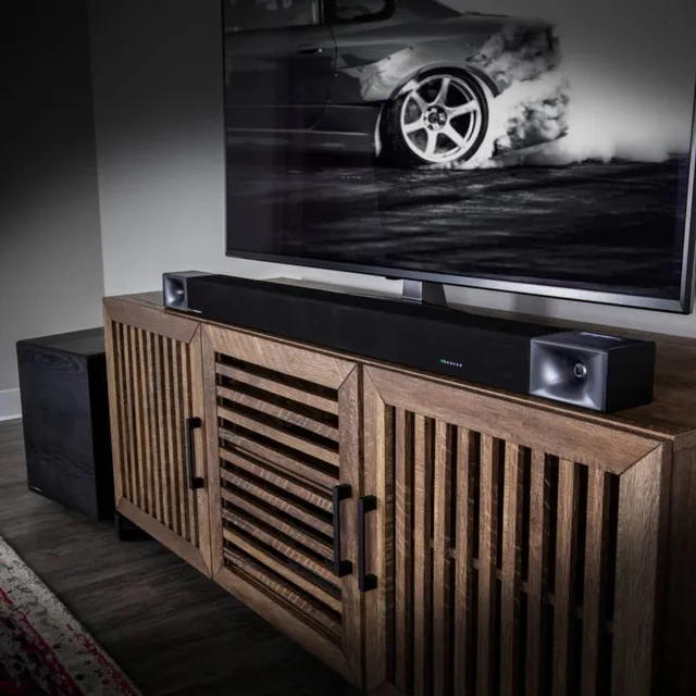 The Klipsch Cinema 600 soundbar system show with a TV and modern TV console 