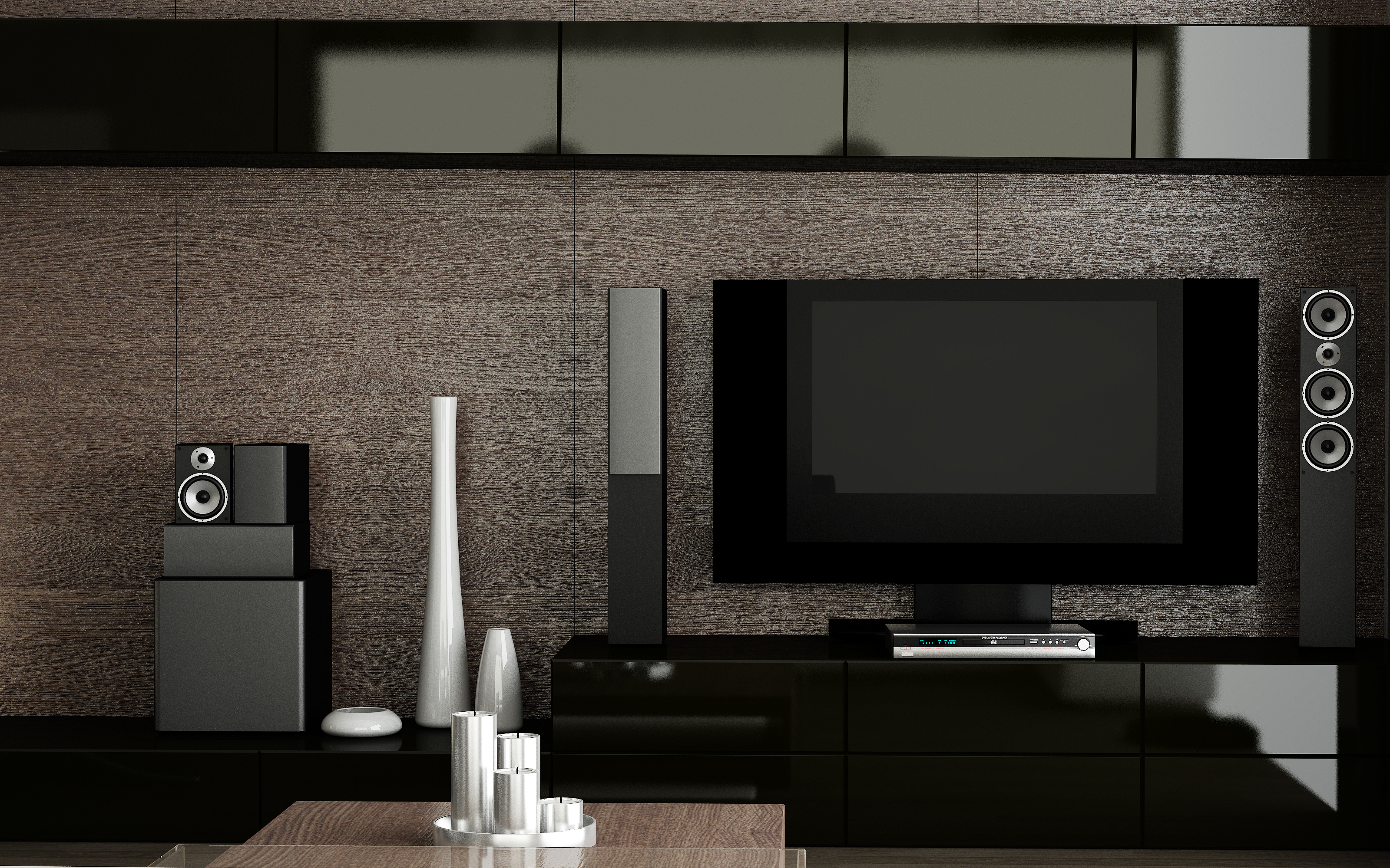 A collection of speakers and subwoofers 