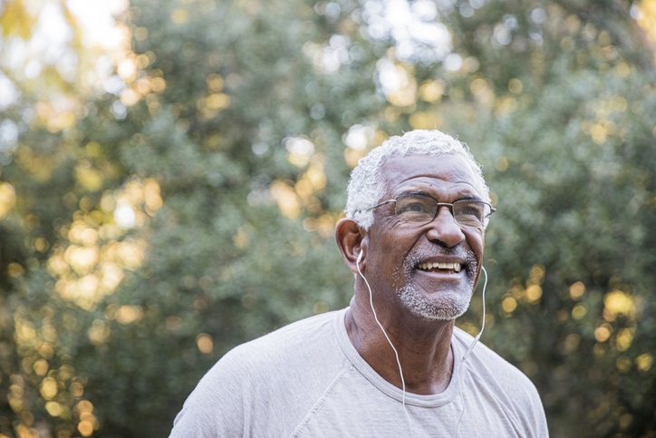 Man on a run with headphones in his ears 