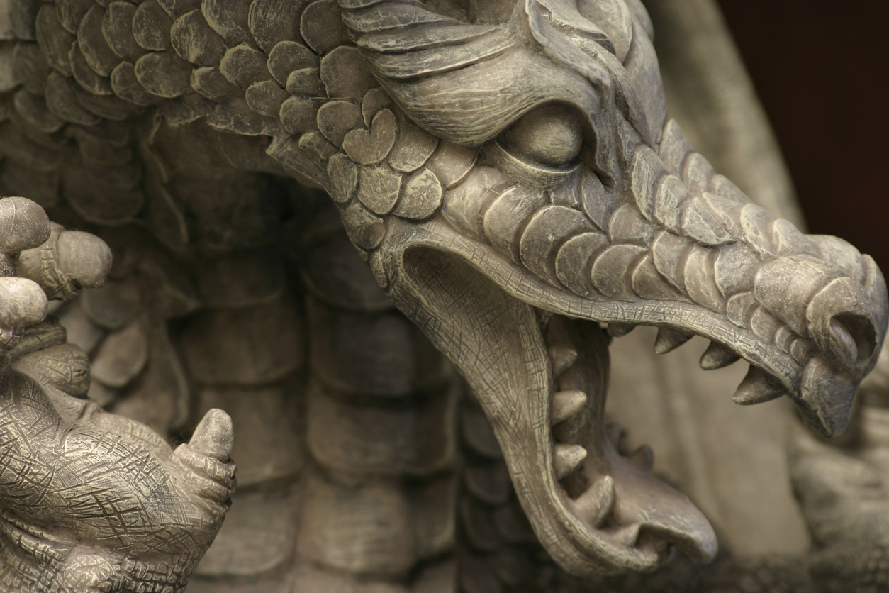 close up of a stone dragon head