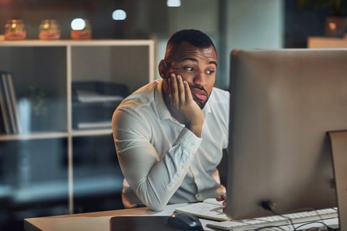 Man Struggling with Slow Internet