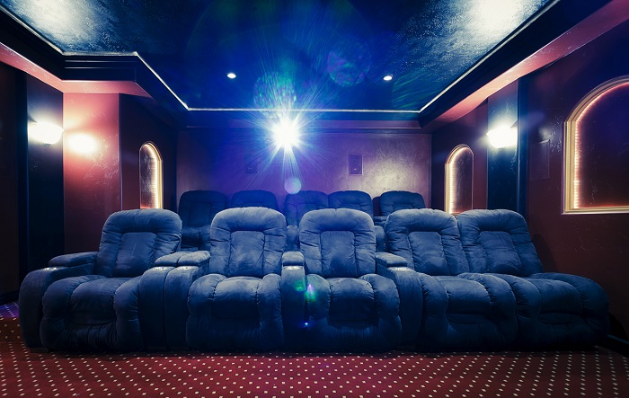 Home theatre with reel shining.