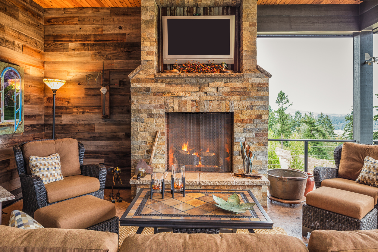 Covered patio with TV and fireplace
