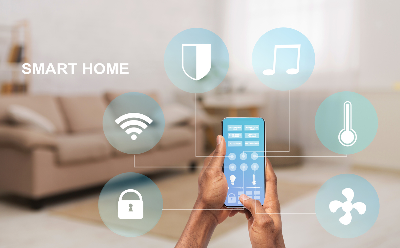 Man using remote smart home control system on a mobile phone