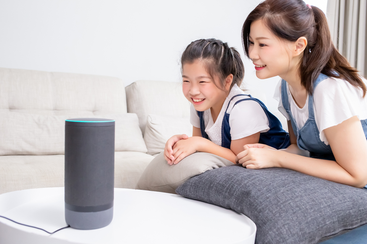 A woman and child use voice control to start their day. 