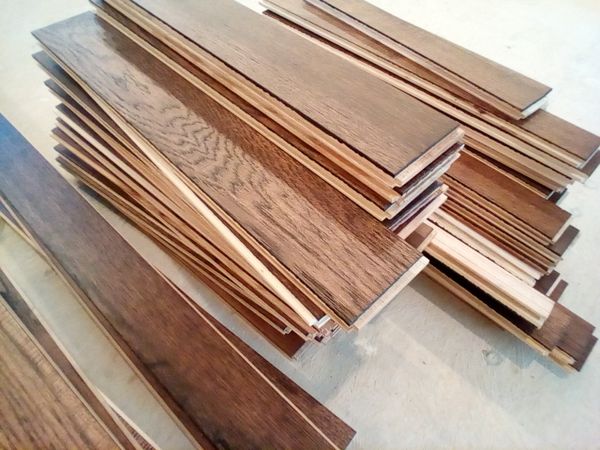 A pile of hardwood floor slabs