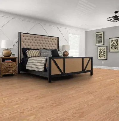 The Shaw Floors Sfa Arden flooring in a bedroom 