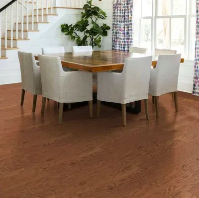 The Shaw Floors Shaw Hardwoods oak hardwood flooring in a dining room 