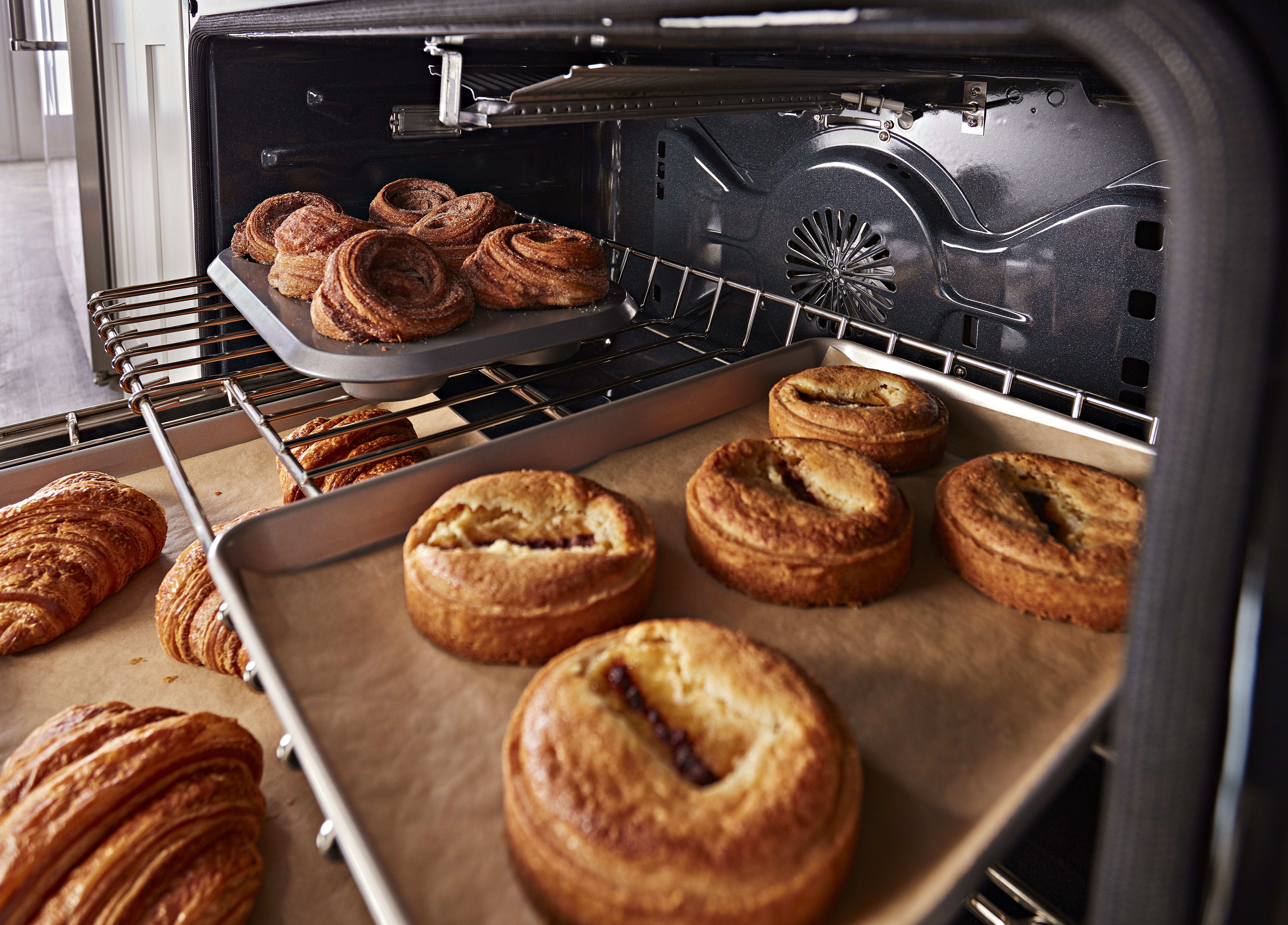 various baked pastries inside kitchenaid kfgc506jsc pro range oven