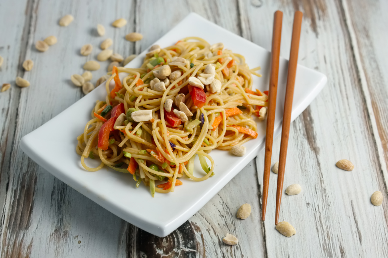 Asian noodles with peanut sauce and mixed vegetables