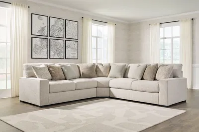 The Benchcraft Ballyton 3-piece sectional in a living room 