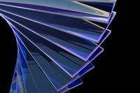 iStock Credit: IURII KRASILNIKOV Multiple panes of blue glass against a black background