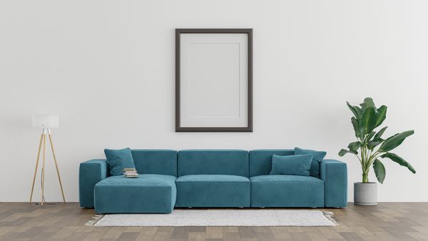 A blue modular sectional with décor 