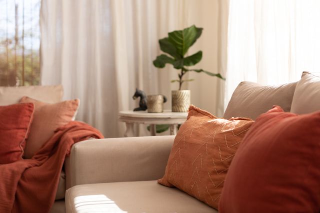 close view of a camel colored sofa in a causal style living room